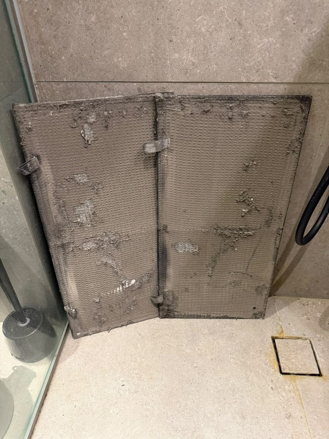 Before: two AC filters matted with grey dust and lint